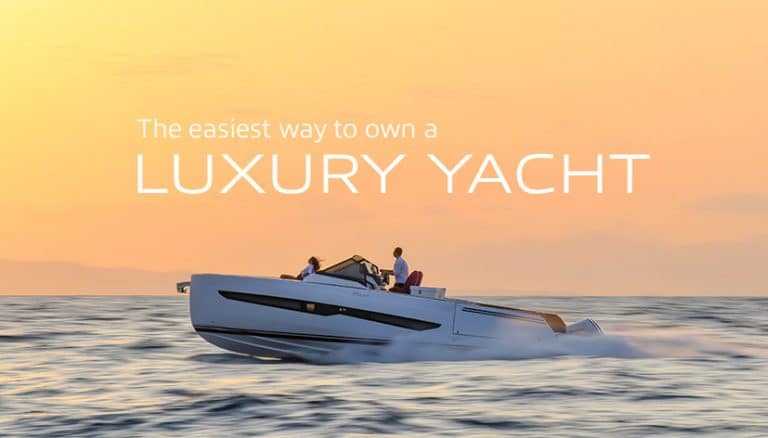Couple enjoying a sunset cruise on an elegant luxury yacht.
